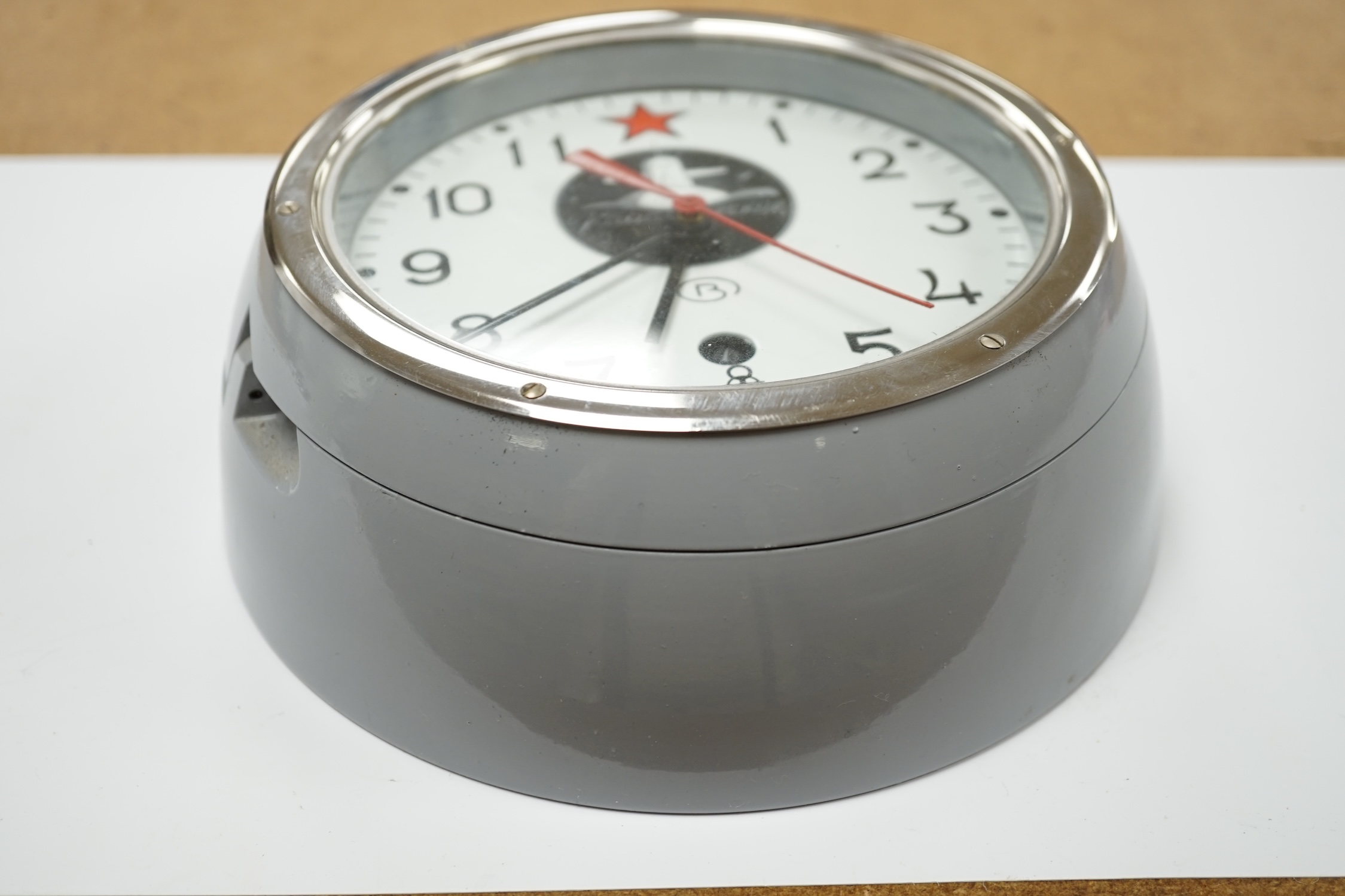 A mid 20th century Soviet style naval timepiece in cast grey painted case, 20cm diameter. Condition - good, however not tested for timekeeping and unable to examine the movement